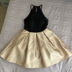 Black and gold cocktail holiday dress with pockets